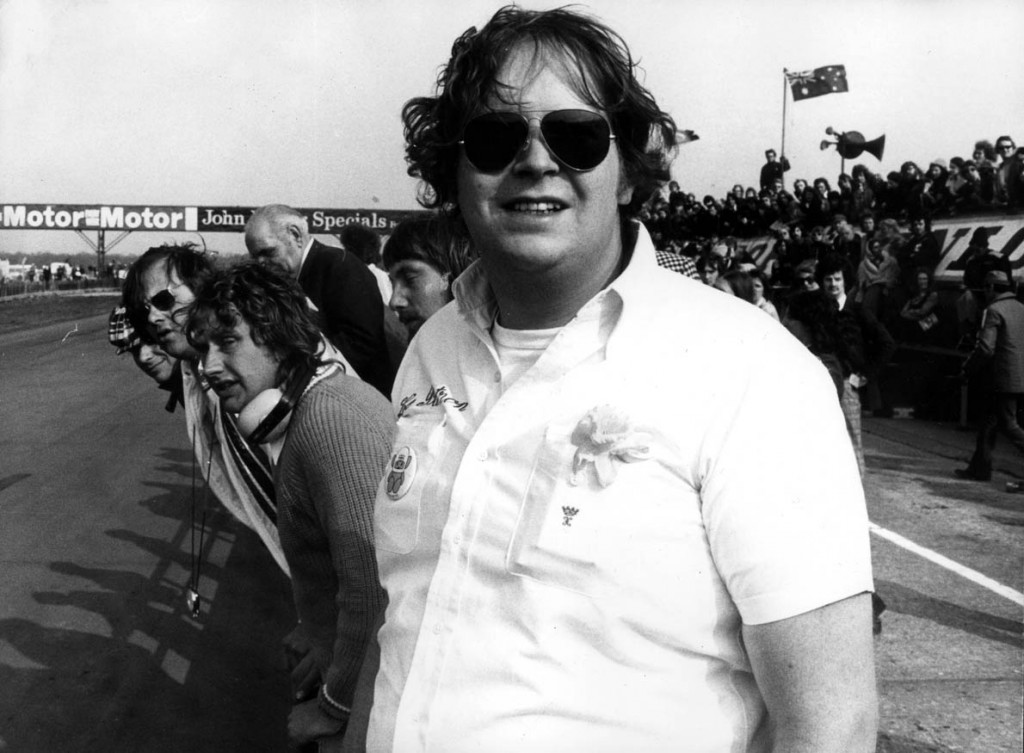 Lord Hesketh, head of Hesketh Racing, standing beside the track at Silverstone, at the very moment when he realised that his driver, james Hunt, had won the international Trophy race (April 1974); it was the team's first great international success, and established Lord Hesketh among the leading racing personalities. 25436-24 Special Price Applies - consult Camera Press or it's local agent