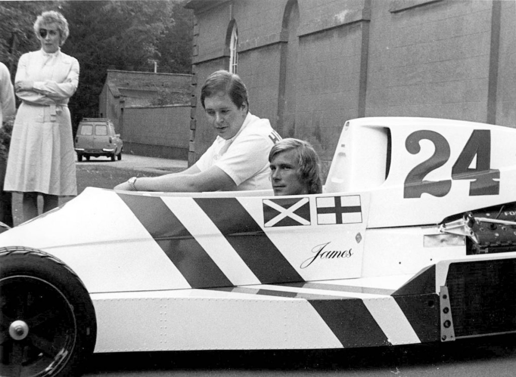 Mandatory Credit: Photo By CHARLES KNIGHT / Rex Features JAMES HUNT WITH ALEXANDER HESKETH, WITH HESKETH MOTHER IN BACKGROUND. 1975 James Hunt motor racing driver sportsman formula one driver sitting in racing car with Alexander Hesketh