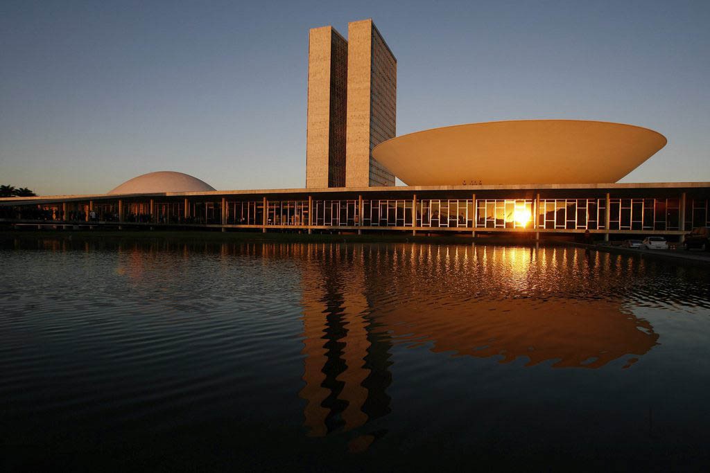 FILE - This Aug 14, 2007 file photo, shows a view of the Brazil's National Congress, designed by Brazilian architect Oscar Niemeyer and inaugurated in 1960, in Brasilia, Brazil. According to a hospital spokeswoman on Wednesday, Dec. 5, 2012, famed Brazilian architect Oscar Niemeyer has died at age 104. (AP Photo/Eraldo Peres, File)