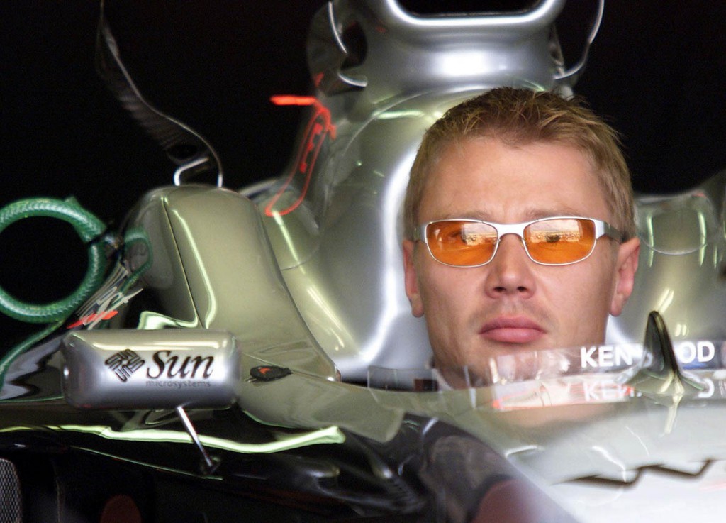 Finnish F1 driver Mika Hakkinen of Team McLaren waits in the pits before the start of the free practice 16 June 2000 in Montreal in preparation for the Canadian Grand Prix which will be held 18 June at the Circuit Gilles Villeneuve. (ELECTRONIC IMAGE) AFP PHOTO/Timothy A. CLARY