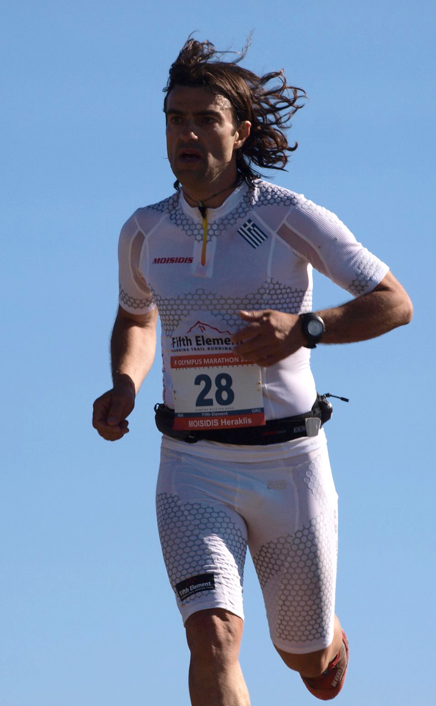 Στον Olympus Marathon το 2011, στο οροπέδιο των μουσών λίγο πριν τον σταθμό  του Μιχάλη στο καταφύγιο.